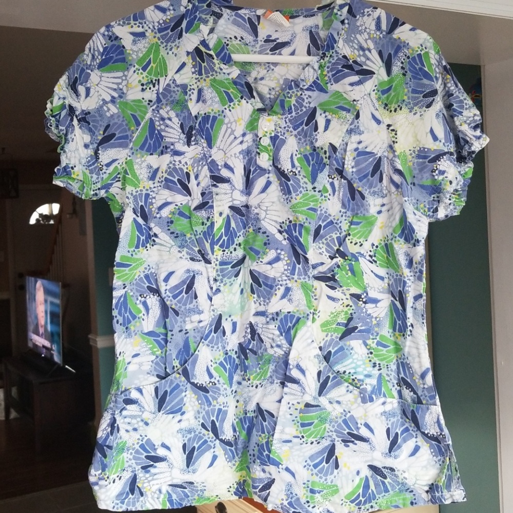 Gently used blue and green pattern scrub top